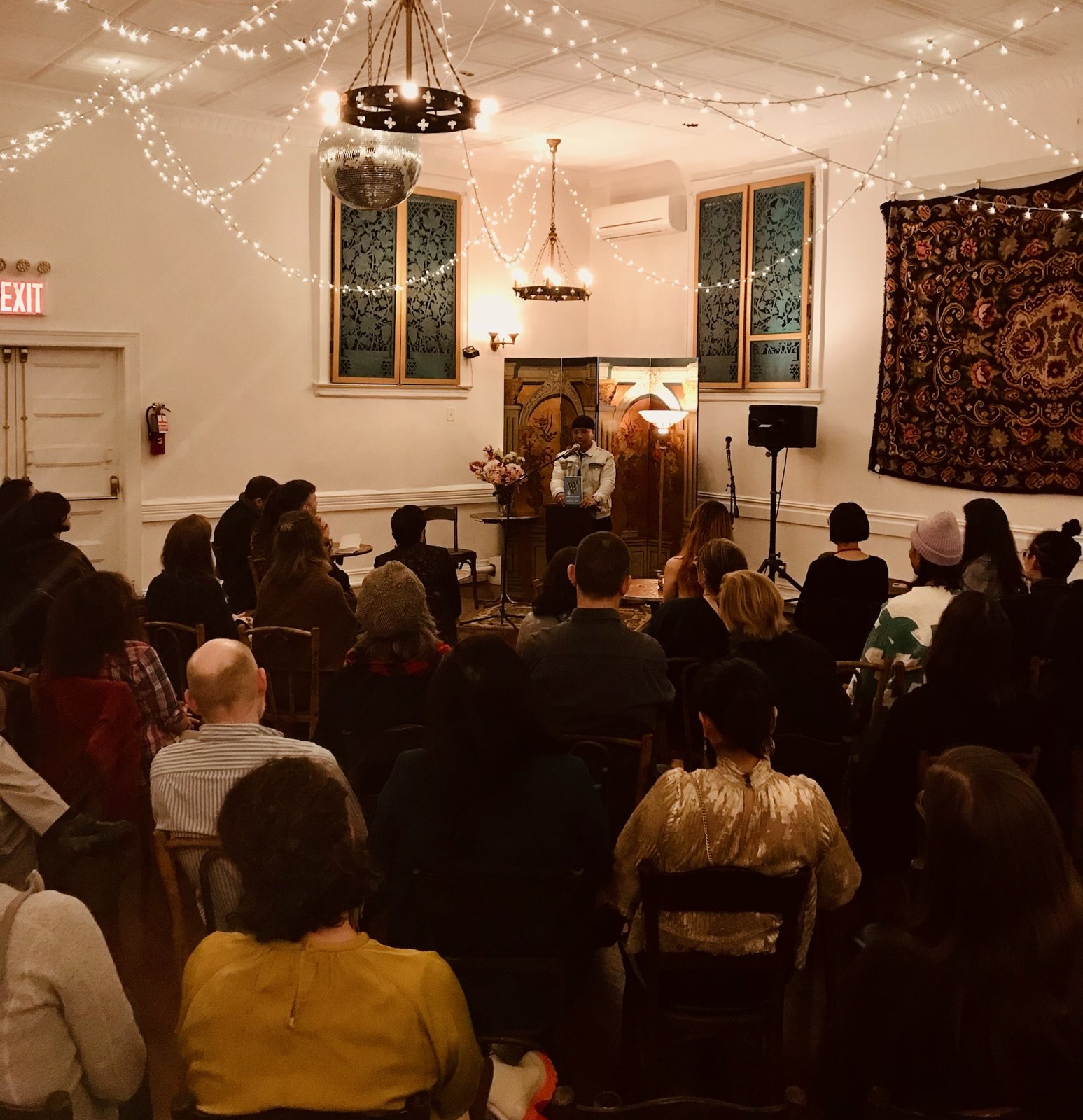 A literary reading in The Urbane salon